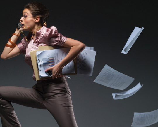 WhyUs_WomanAndPapers